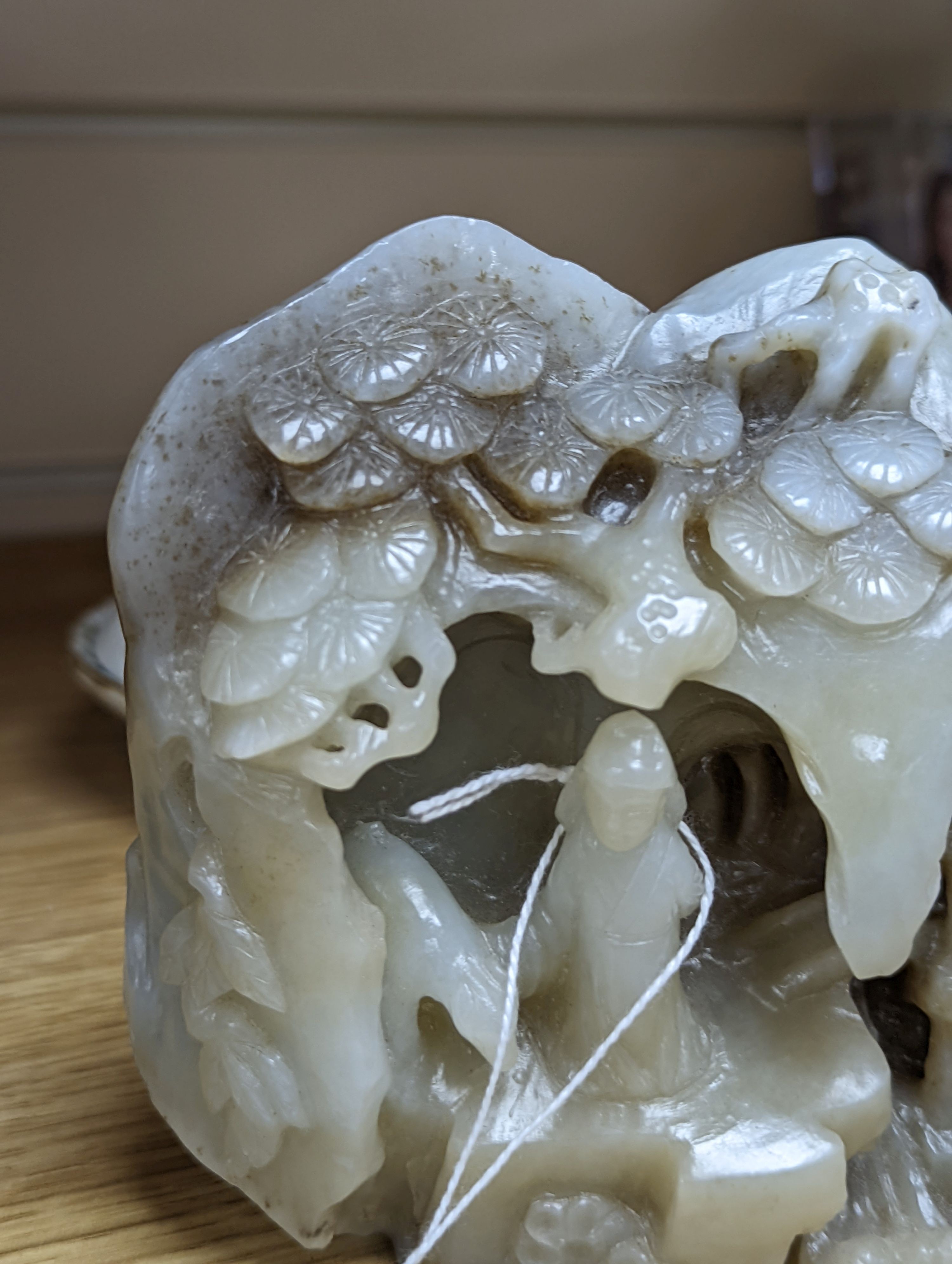 A mountain jade sculpture, 12cm high, together with other Chinese ceramics